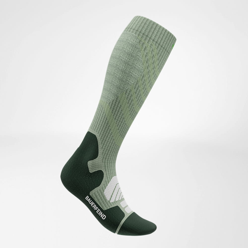 Side view of the merino hiking socks in light green