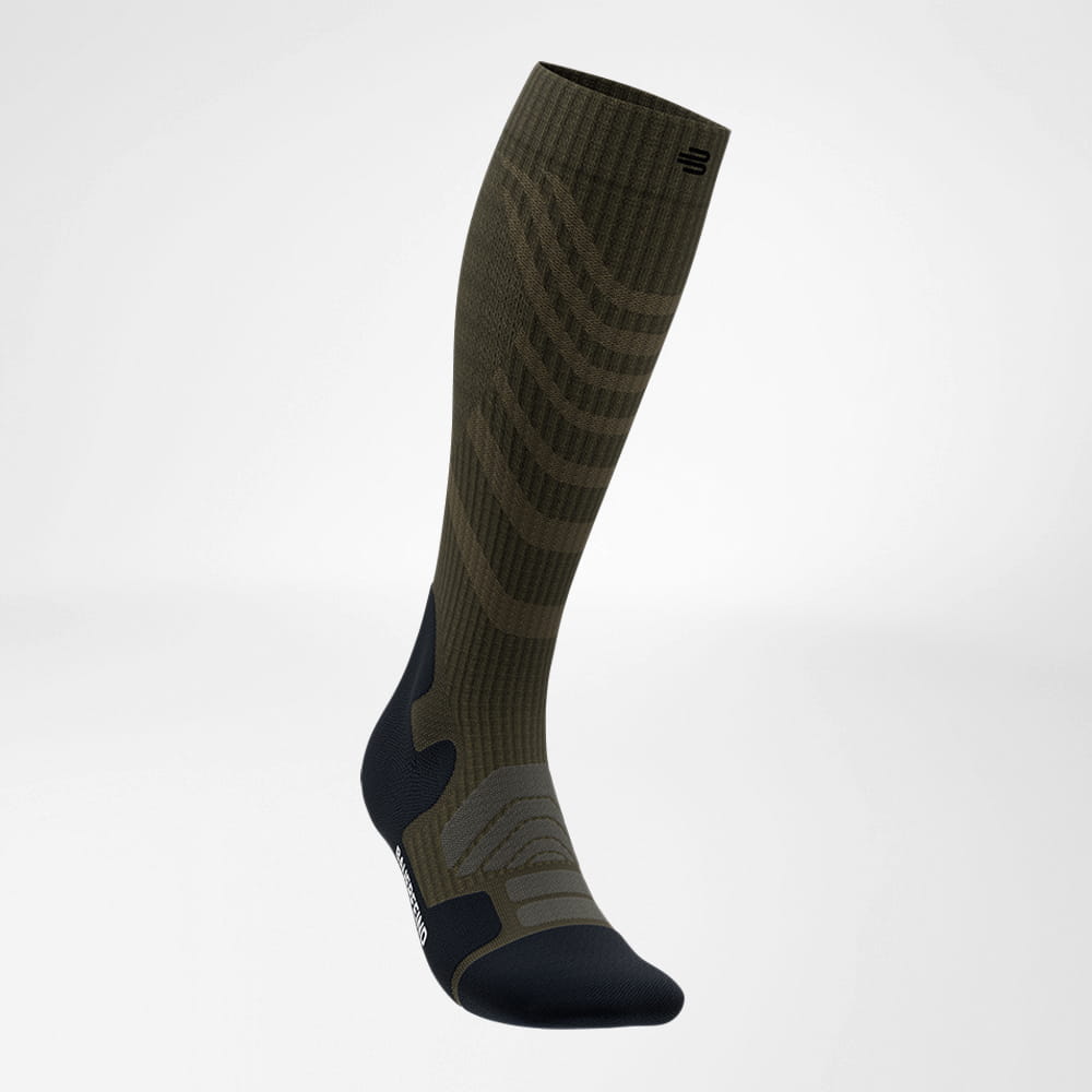Lateral front view of the merino hiking socks in dark green