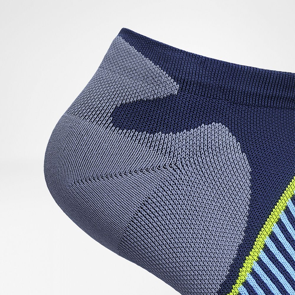 Detailed view of the heel protection zone of the blue short running socks