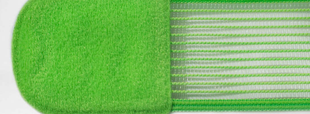 Detailed view of the green taping belt belonging to the ankle bandage