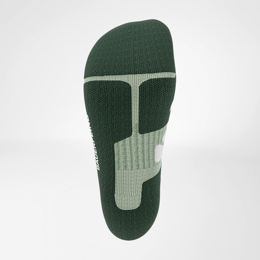 View of the merino hiking socks from below in light green