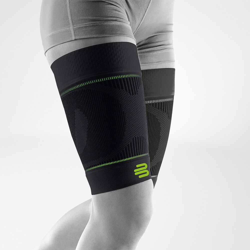 Complete view of the black thighs Sport Sleeves on the stylized gray leg
