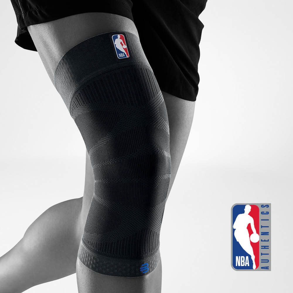 Complete view of black Knee Sleeve NBA on the stylized gray body