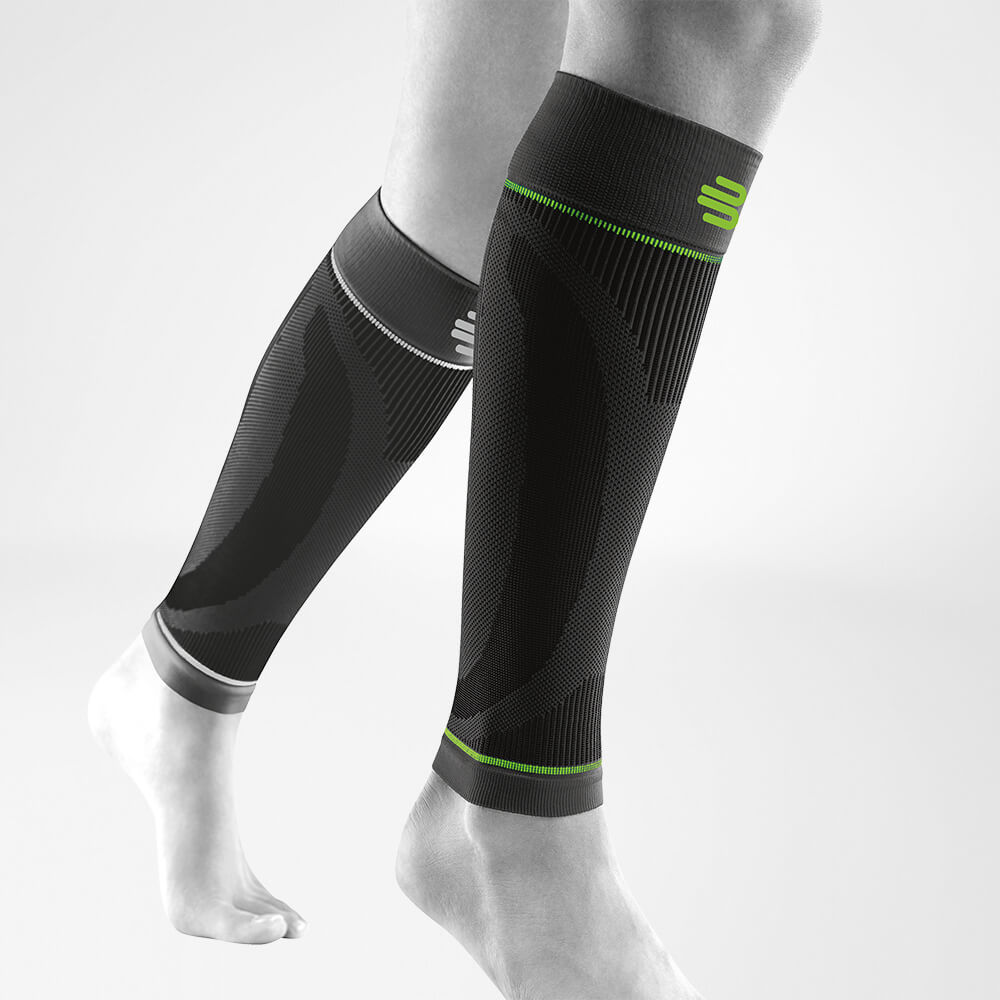 Complete view of the black lower legs Sport Sleeves on the stylized gray leg