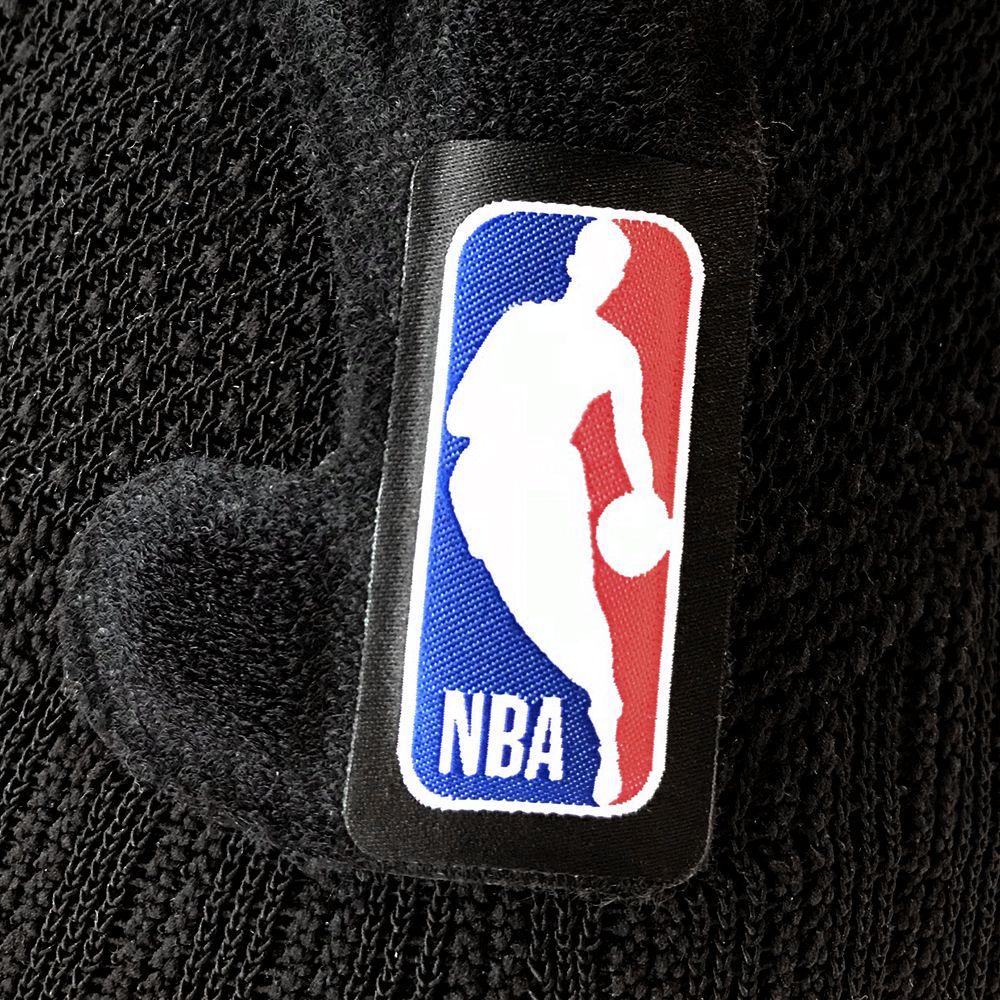 Close up of the NBA logos on the Black Sports Knee Support NBA