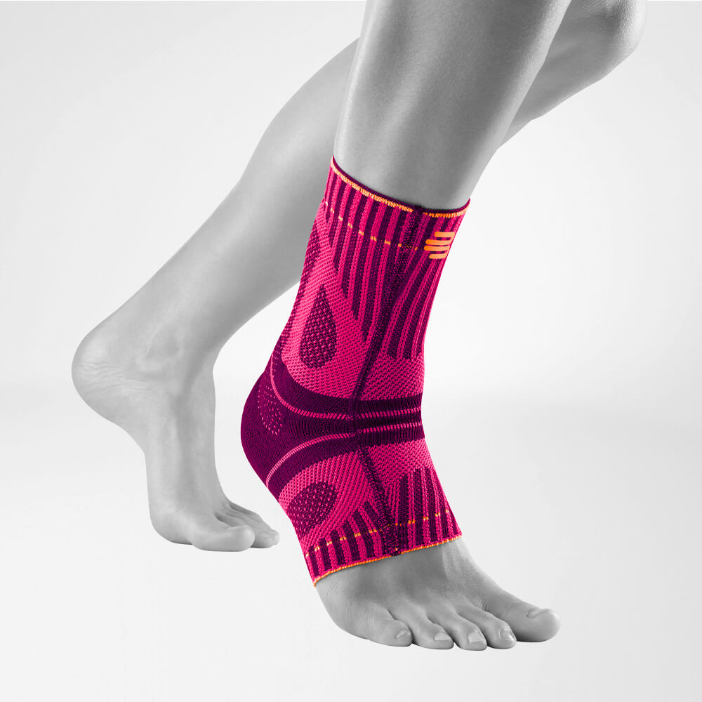 Lateral complete view of the pink Achilles tendon bandage on the stylized gray foot