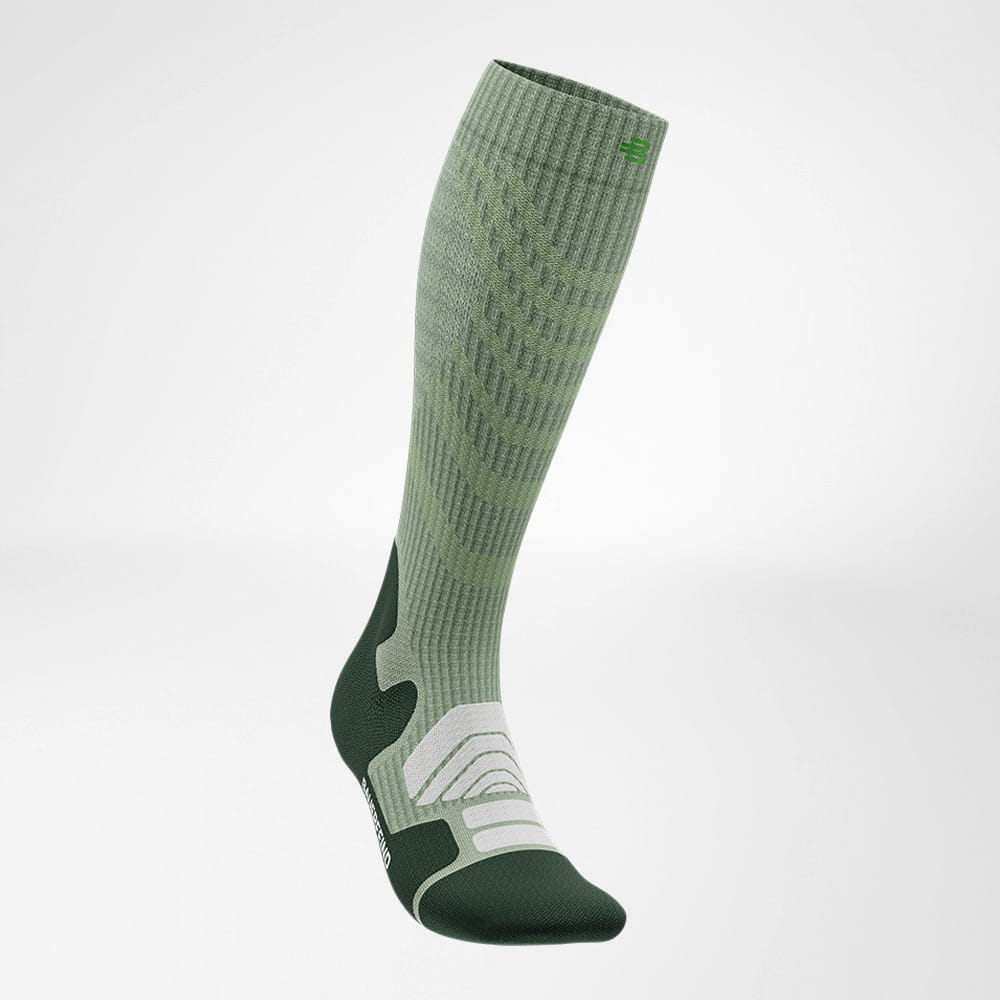 Lateral front view of the merino hiking socks in light green