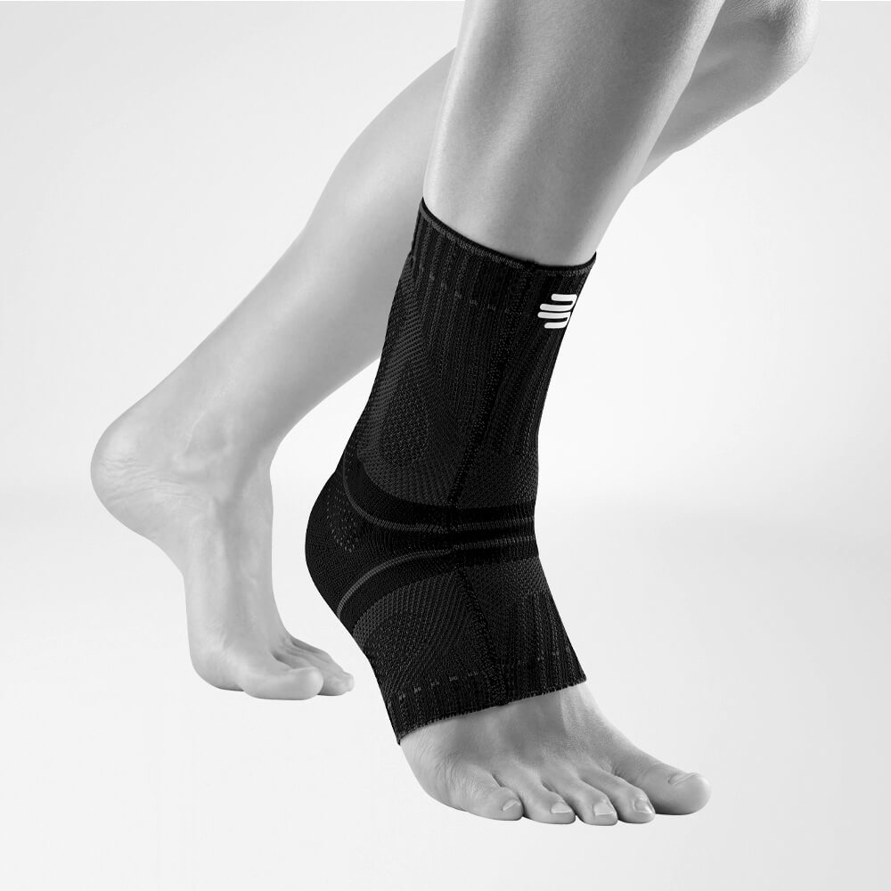 Lateral complete view of the black Achilles tendon bandage on the stylized gray foot