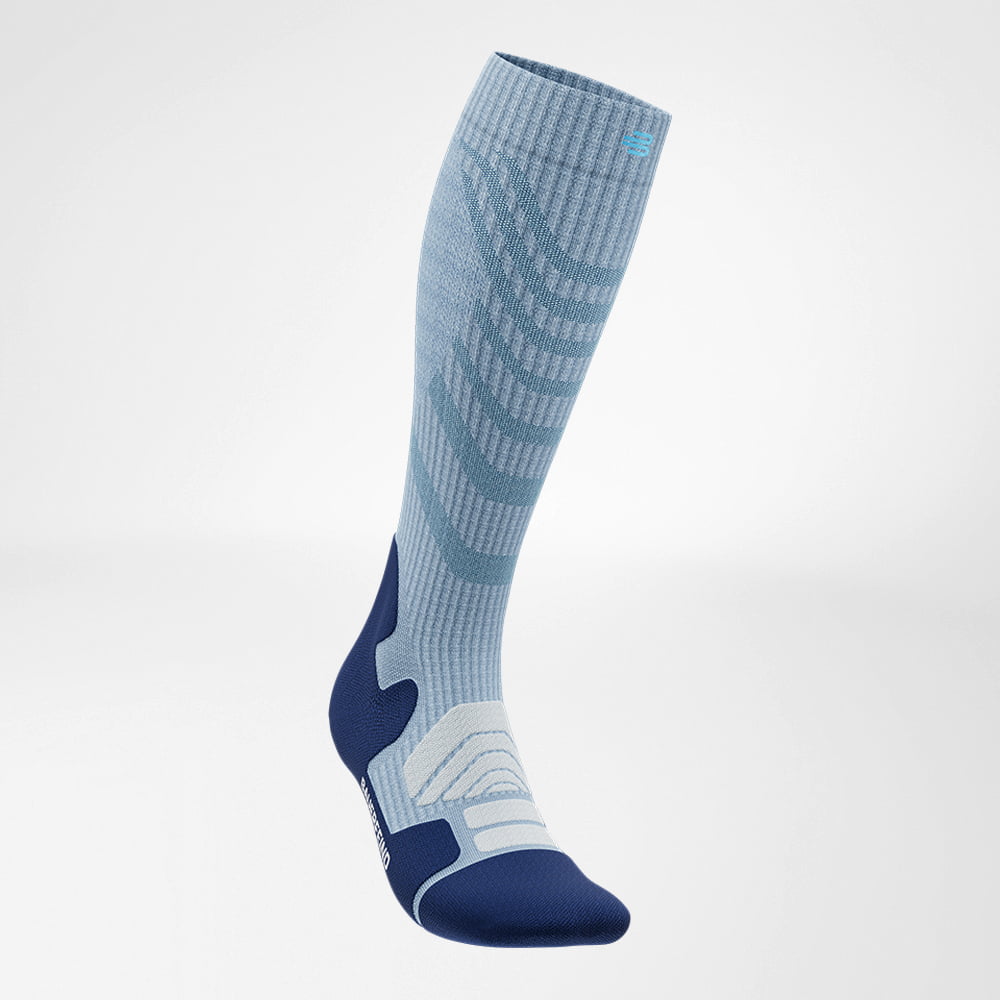 Lateral front view of the merino hiking socks in light blue