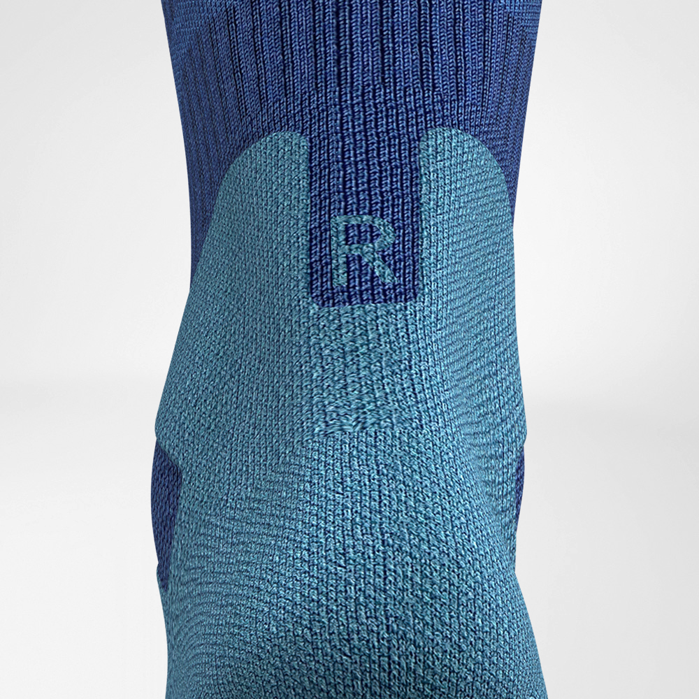 Detailed recording of the Achilles Comfort Zone of the dark blue medium -length Merino - hiking socks