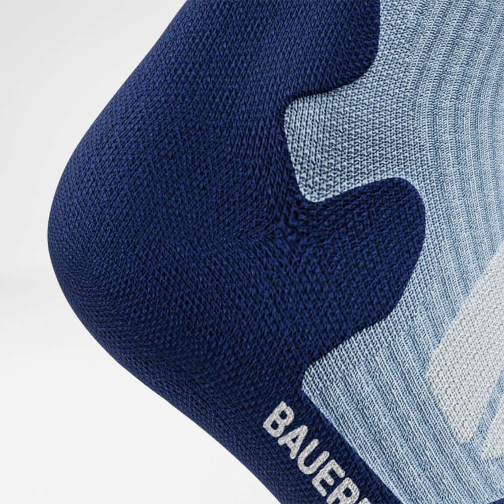 Detailed view of the heel of the merino hiking socks in light blue
