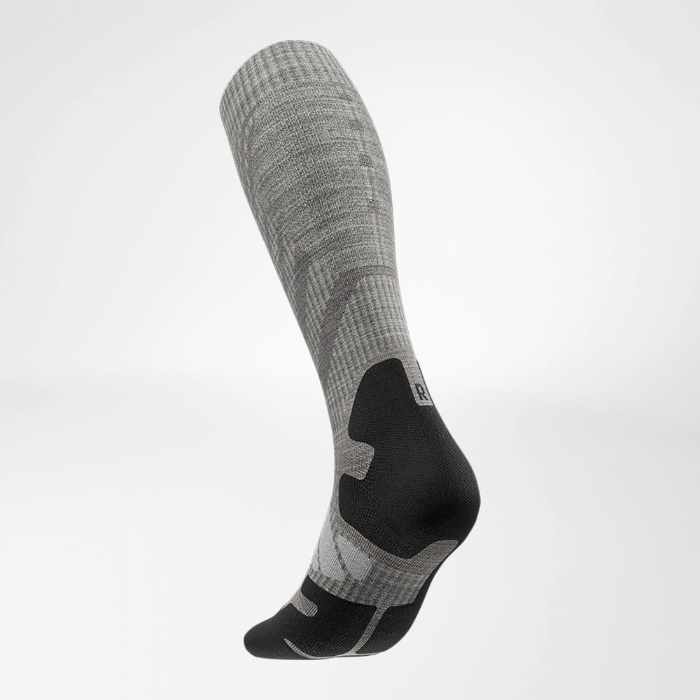 Lateral back view of the merino hiking socks in light gray