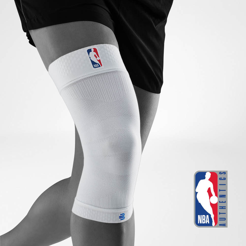 Complete view of white knee Sleeve NBA on the stylized gray body