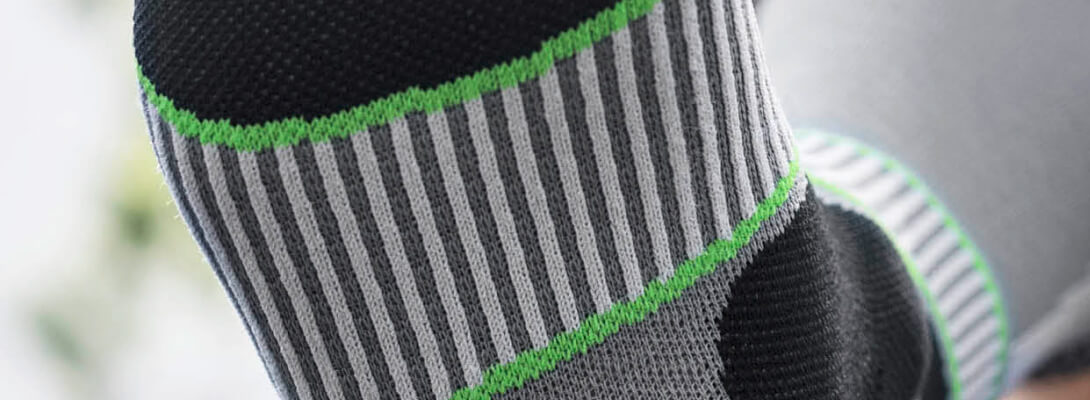 Detailed view on the upholstery zone on the foot bed of a trekking sock